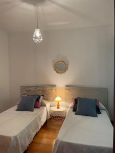 Postel nebo postele na pokoji v ubytování Apartamento Fin da terra