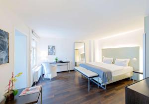 Postel nebo postele na pokoji v ubytování Arthotel Heidelberg