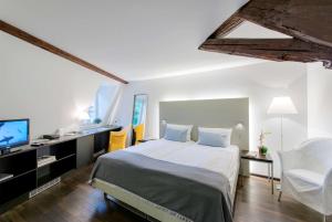 Postel nebo postele na pokoji v ubytování Arthotel Heidelberg + 24 fotografií