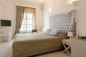 Letto o letti in una camera di Daedalus Hotel