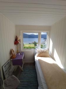 Postel nebo postele na pokoji v ubytování Graceland Norway