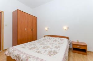 Llit o llits en una habitació de Apartments Ivanka