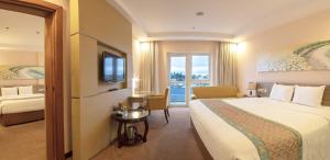 Rúm í herbergi á Vietsovpetro Hotel Dalat