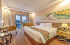 Rúm í herbergi á Vietsovpetro Hotel Dalat