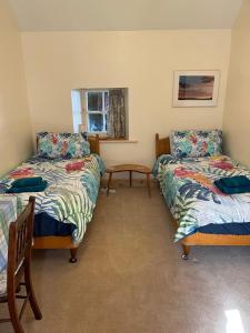 Кровать или кровати в номере The Old Ferryhouse