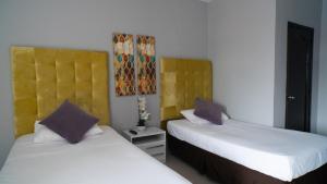 Postel nebo postele na pokoji v ubytování Hotel Boutique Casa Umiña
