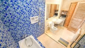 Ein Badezimmer in der Unterkunft Ocean Star Apartment Sanur