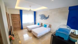 Ein Sitzbereich in der Unterkunft Ocean Star Apartment Sanur