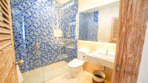 Ein Badezimmer in der Unterkunft Ocean Star Apartment Sanur