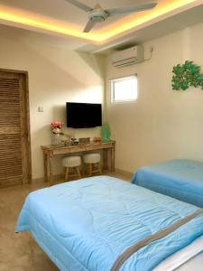 TV/Unterhaltungsangebot in der Unterkunft Ocean Star Apartment Sanur