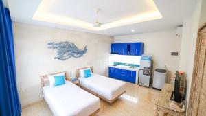 Ein Bett oder Betten in einem Zimmer der Unterkunft Ocean Star Apartment Sanur