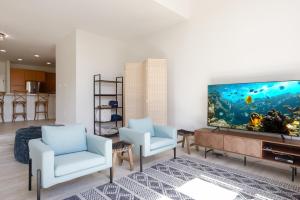 TV a/nebo společenská místnost v ubytování Waikoloa Colony Villas #2105