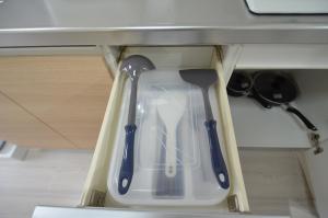 a drawer with two utensils sitting under a table at Amont Nakamura - Vacation STAY 83274 in Miyazaki