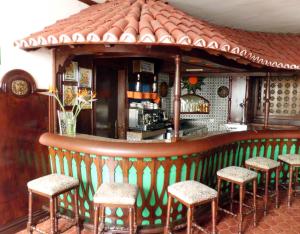 El salón o zona de bar de Hotel Casa del Sol