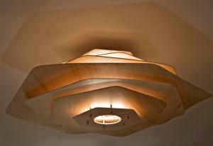 a light fixture hanging from a ceiling at Witt Istanbul Suites in Istanbul