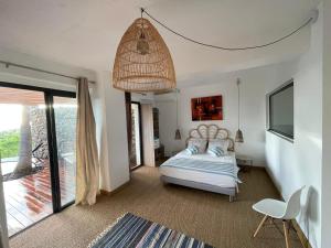 מיטה או מיטות בחדר ב-Villa Prana