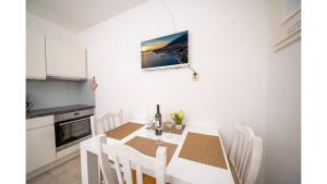 Kuchyň nebo kuchyňský kout v ubytování Apartments Magdalena + 31 fotografií