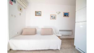 Postel nebo postele na pokoji v ubytování Apartments Magdalena