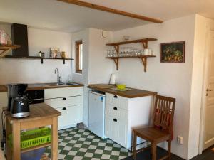 A kitchen or kitchenette at Lunkaberg Bed & Breakfast