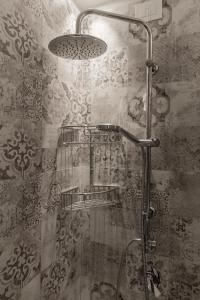a shower with a glass door in a bathroom at EUROPA Hotel in Vasto