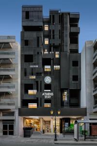 a building with an athens sky sign on it at Thisean Modern Suites By Athens Stay in Athens