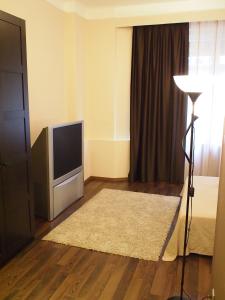 TV a/nebo společenská místnost v ubytování Budapest Suites