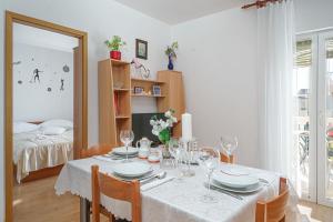 Postel nebo postele na pokoji v ubytování Apartments Tamaris