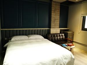 Letto o letti in una camera di 18世紀普魯士藍現代寓所Prussian Blue Inn原愛迪亞旅社