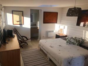 Postel nebo postele na pokoji v ubytování Chambre d’hôtes Pyla sur Mer