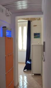 Televízia a/alebo spoločenská miestnosť v ubytovaní Casa Marianna Short Lets