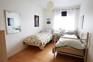 Ein Bett oder Betten in einem Zimmer der Unterkunft Liljulon - Views - Location