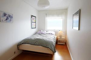 Ein Bett oder Betten in einem Zimmer der Unterkunft Liljulon - Views - Location