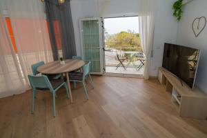 TV a/nebo společenská místnost v ubytování HomeHolidaysRentals Eiffel - Costa Barcelona