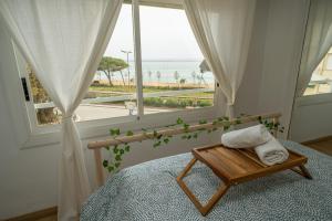 Postel nebo postele na pokoji v ubytování HomeHolidaysRentals Eiffel - Costa Barcelona