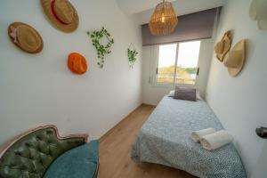 Postel nebo postele na pokoji v ubytování HomeHolidaysRentals Eiffel - Costa Barcelona