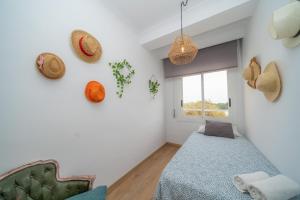 Postel nebo postele na pokoji v ubytování HomeHolidaysRentals Eiffel - Costa Barcelona