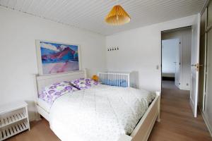 Ein Bett oder Betten in einem Zimmer der Unterkunft Liljulon - Views - Location