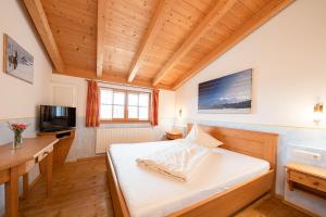 Voodi või voodid majutusasutuse Duftbräu toas