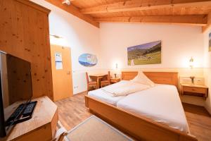 En eller flere senge i et værelse på Duftbräu