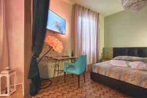 Postel nebo postele na pokoji v ubytování Le Stagioni Luxury Suite