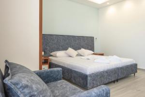 Seaside Hotel客房内的一张或多张床位