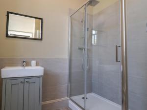 a bathroom with a shower and a sink at Windyridge in Settle