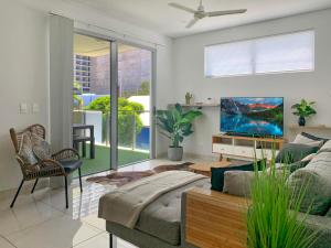 Khu vực ghế ngồi tại Darwin City Chic@Kube Apartments