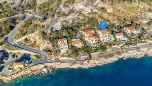 an aerial view of a road next to the ocean at Apartments Katarina in Baška