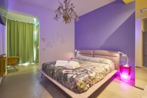 Postel nebo postele na pokoji v ubytování Le Stagioni Luxury Suite