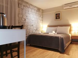 Postel nebo postele na pokoji v ubytování Carol Rooms