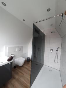 Koupelna v ubytování Bigge Huus Ferienhaus + 15 fotografií