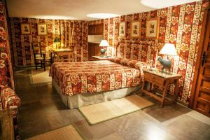 Postel nebo postele na pokoji v ubytování Hotel Boutique Casa de Orellana