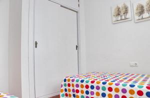 Postel nebo postele na pokoji v ubytování Apartamento Violeta + 5 fotografií