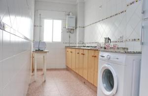 Kuchyň nebo kuchyňský kout v ubytování Apartamento Violeta